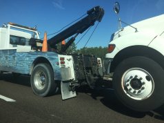 Flatbed Tow Truck vs Hook and Chain: Which Is Better?